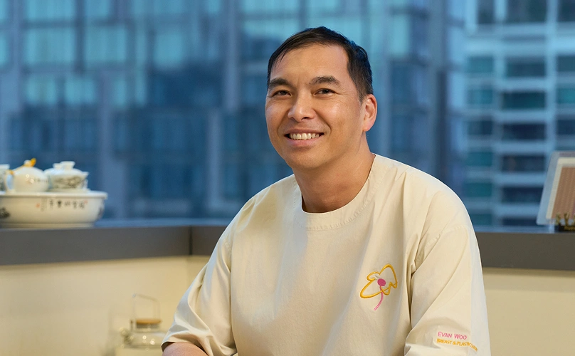 Portrait of Dr. Evan Woo, a plastic and reconstructive breast surgeon in Singapore.